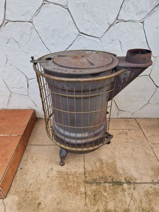 Chimenea leña metal antigua