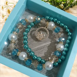 Set 2 braccialetti turchese e bianco