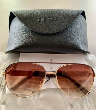 Gafas sol Guess doradas mujer