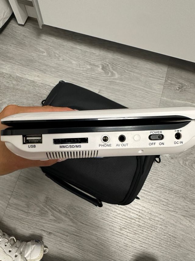 Reproductor DVD Portátil NPG + Películas