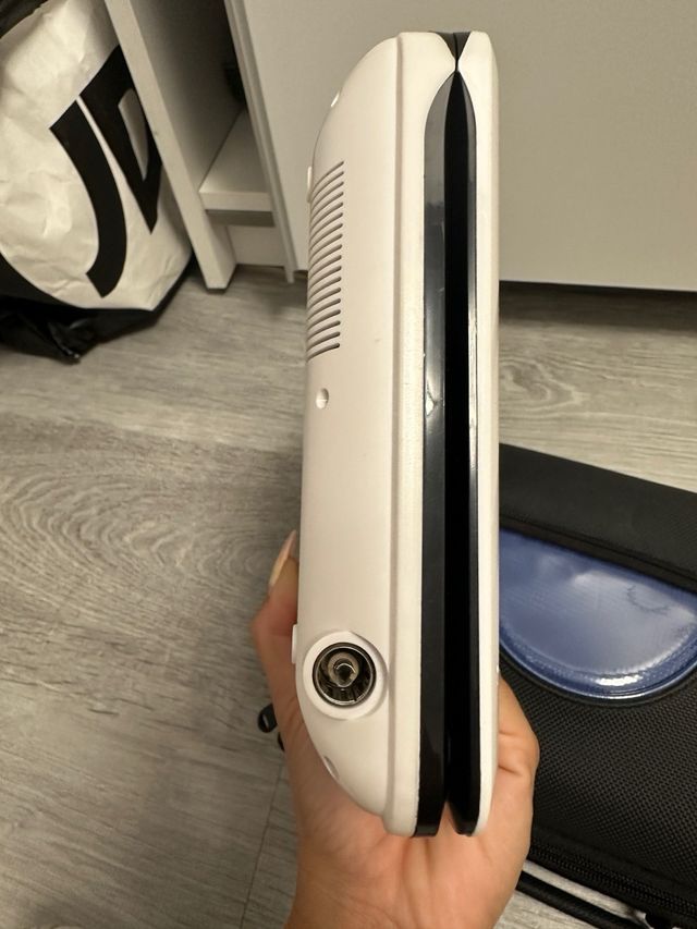 Reproductor DVD Portátil NPG + Películas