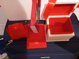 Omega: caja reloj - roja y blanca