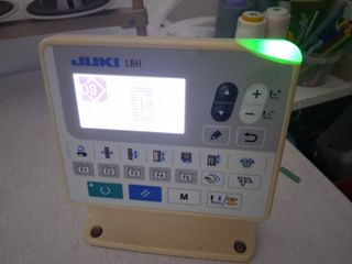 Máquina ojales Juki electrónica