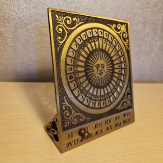 Calendario perpetuo vintage in ottone