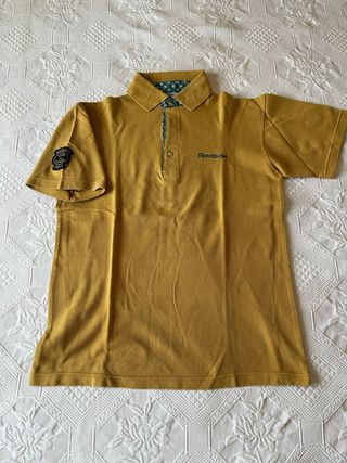 Polo Reebok color mostaza talla M