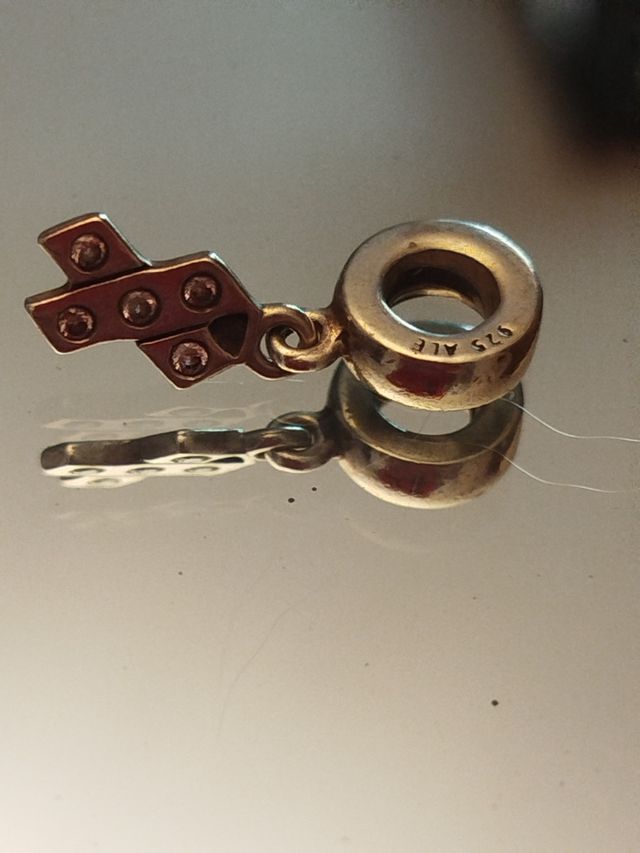 Charm Pandora lazo rosa