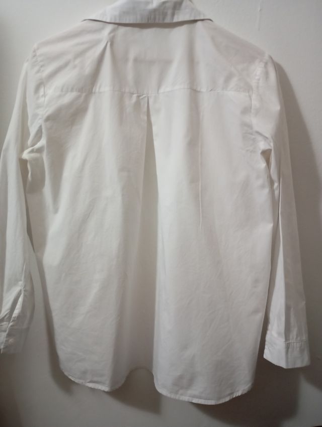 Camisas blancas de mujer.