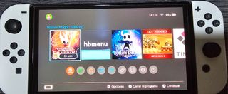 Nintendo Switch OLED in bianco e nero + 26 giochi