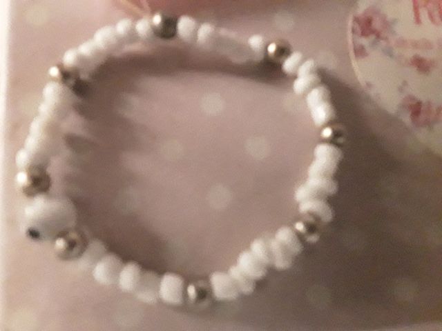 Pulsera niña plata y perla blanca,más piedras ónix