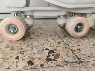 Patines Oxelo 4 ruedas n° 39. Cubrepatines y bolsa