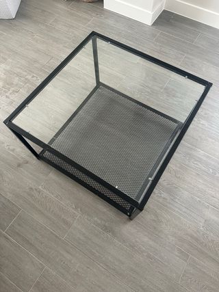 Mesa centro cristal y metal negra