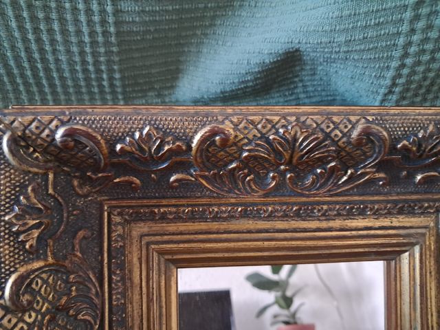 Espejo dorado decorativo