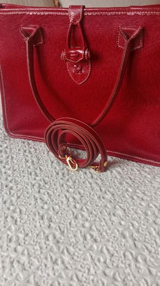 Bolso Ángel Serrano Piel Caprina burdeos.