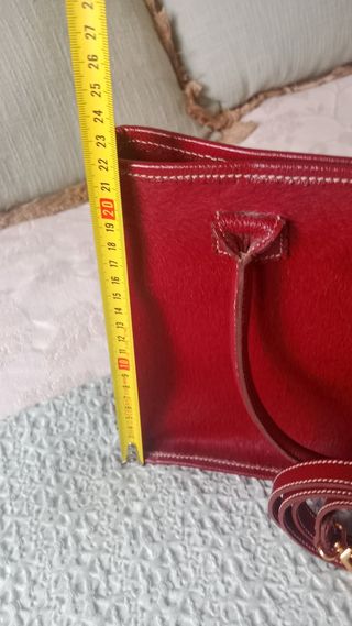 Bolso Ángel Serrano Piel Caprina burdeos.