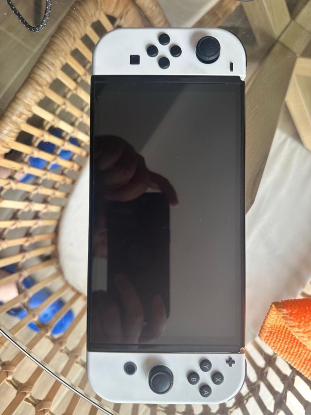 Nintendo Switch OLED + maletín