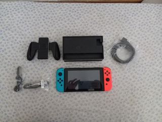 Nintendo Switch roja y azul + juegos