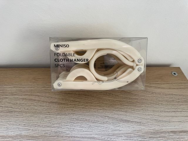 Perchas plegables viaje - Blancas