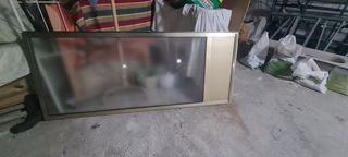 Puerta aluminio con persiana