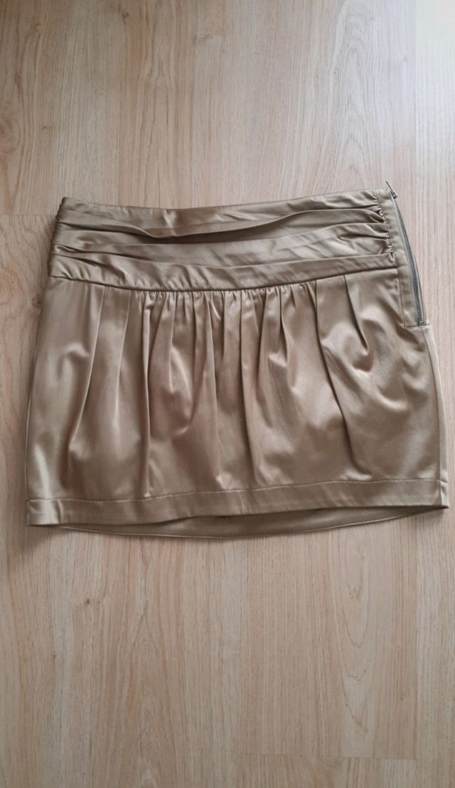 Mini falda dorada Mango