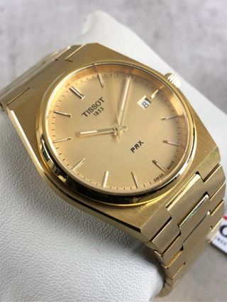 Reloj Tissot PRX Oro