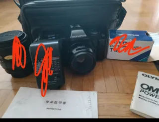 Olympus OM101: Cámara réflex con bolsa