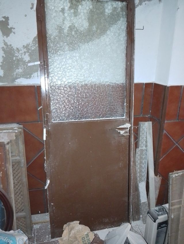 Puerta hierro con cristal