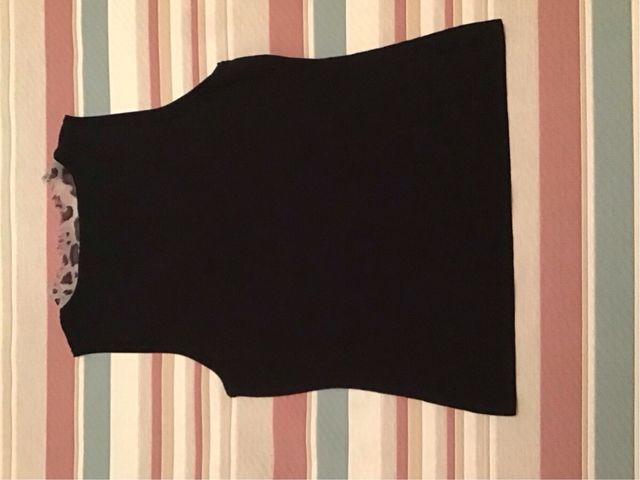 Top negro sin mangas, talla G