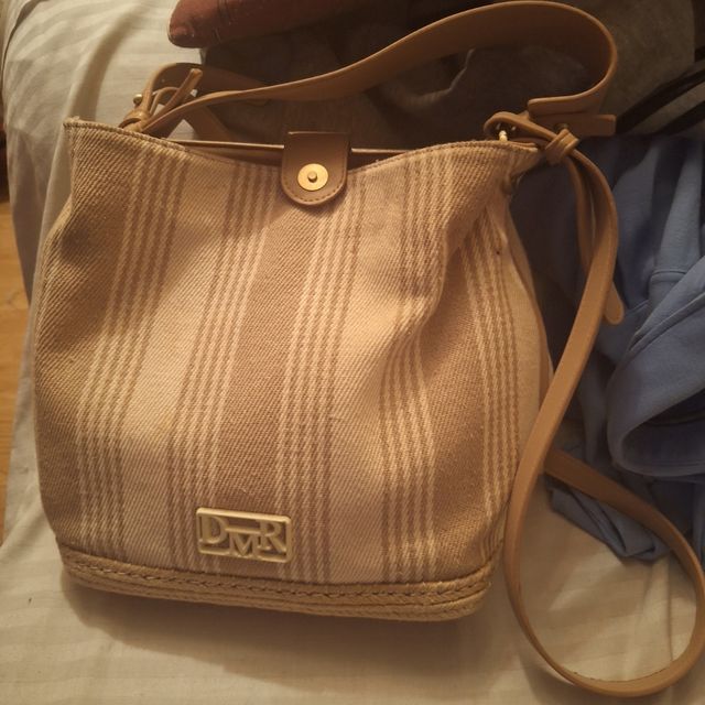 Bolso MSK negro con perforaciones