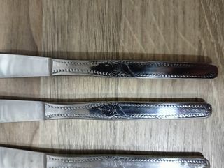 12 cuchillos de acero inoxidable