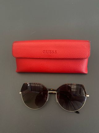 Gafas sol Guess doradas marrones