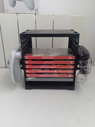 Mando Nintendo Switch "nuevo" + estructura juegos!