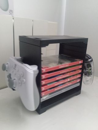 Mando Nintendo Switch "nuevo" + estructura juegos!