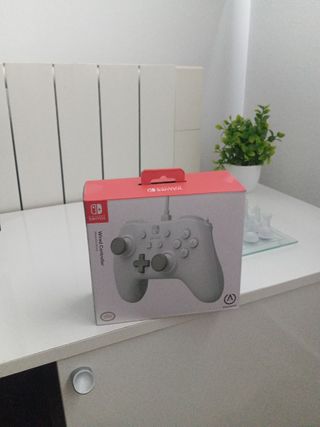 Mando Nintendo Switch "nuevo" + estructura juegos!