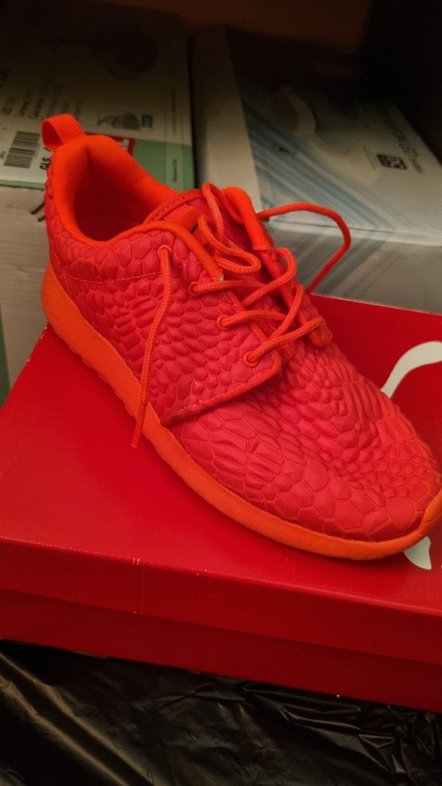 Tenis Nike color naranja