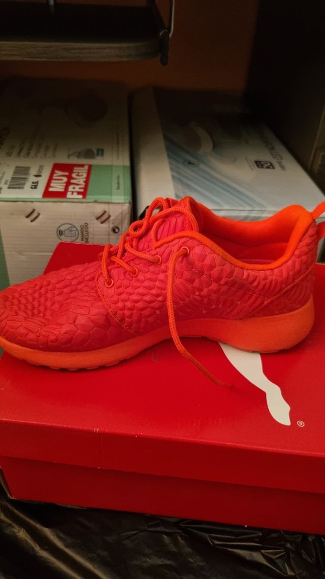 Tenis Nike color naranja