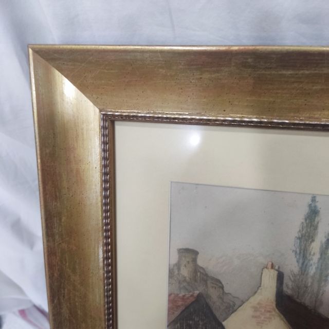  Marco dorado con paspartú y lámina .