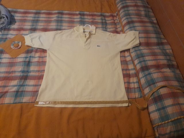 2 articulos ..Polo amarillo y  chaqueta grabate XL