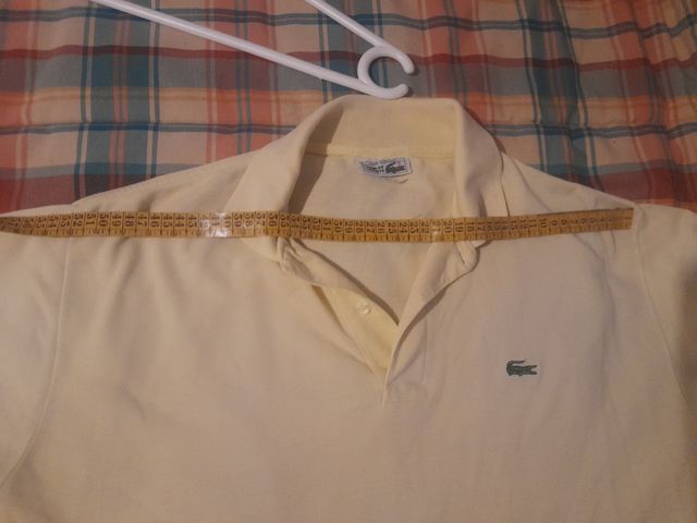 2 articulos ..Polo amarillo y  chaqueta grabate XL