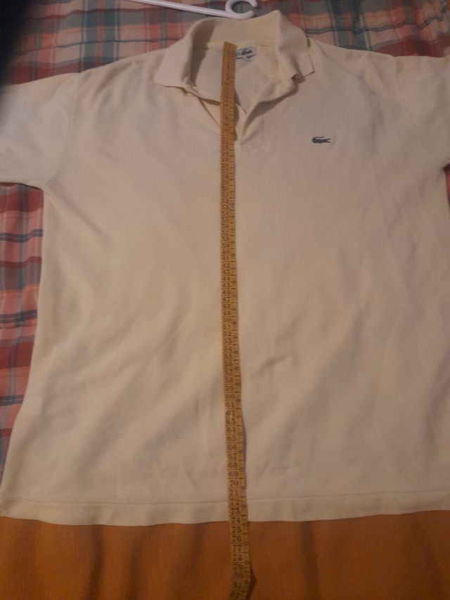 2 articulos ..Polo amarillo y  chaqueta grabate XL