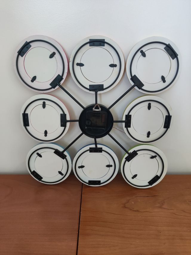 Reloj de pared con fotos intercambiables