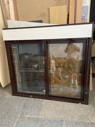 Ventana corredera con persiana