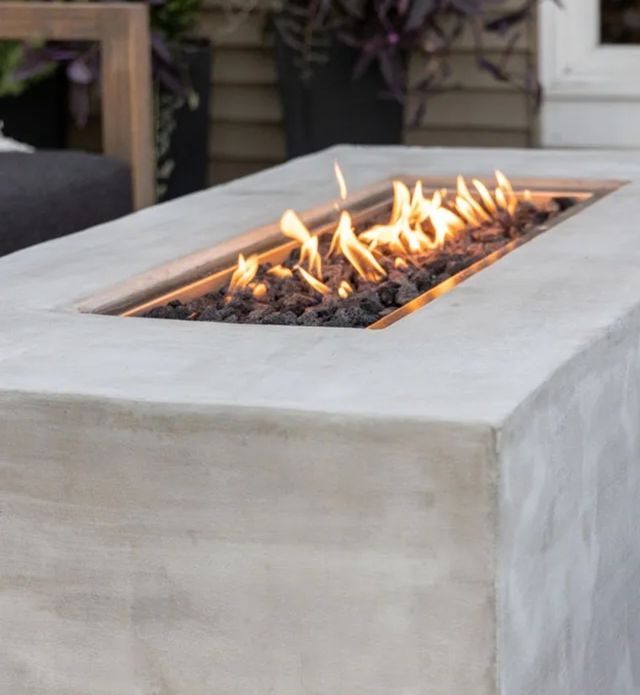 Mesa fogata exterior gris / braseros a medida