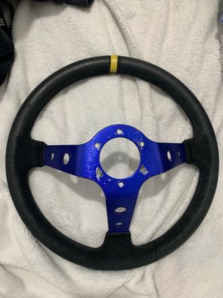Volante OMP desplazado azul