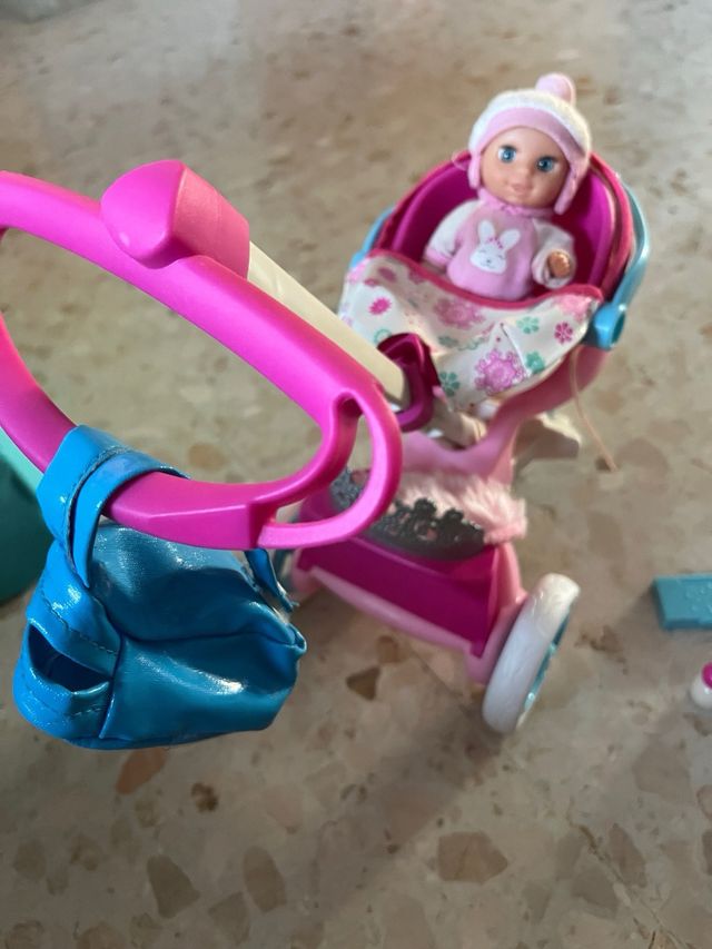 Muñeca Nancy con carrito bebé