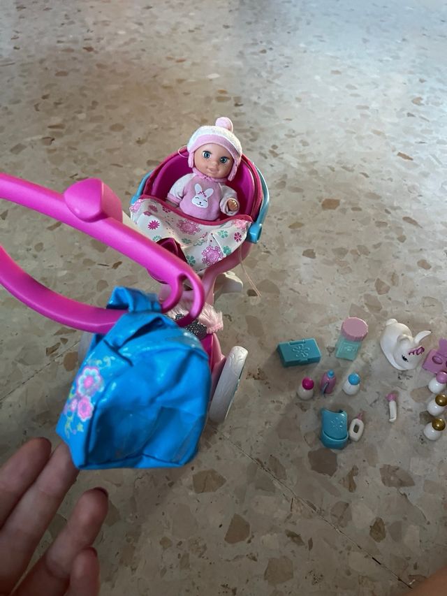 Muñeca Nancy con carrito bebé