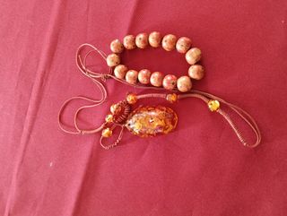 Collana e braccialetto in legno e ambra