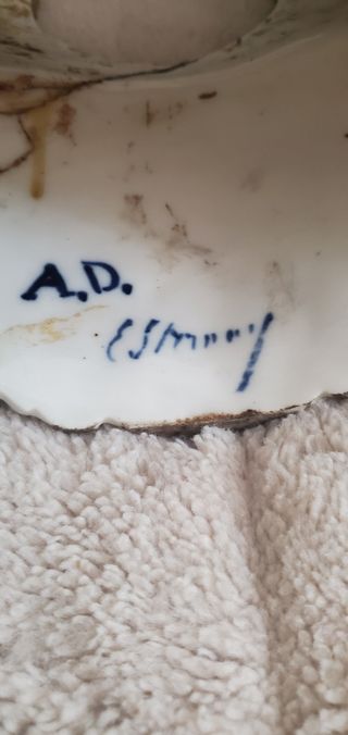 Scultura porta orologi antica