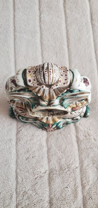 Scultura porta orologi antica