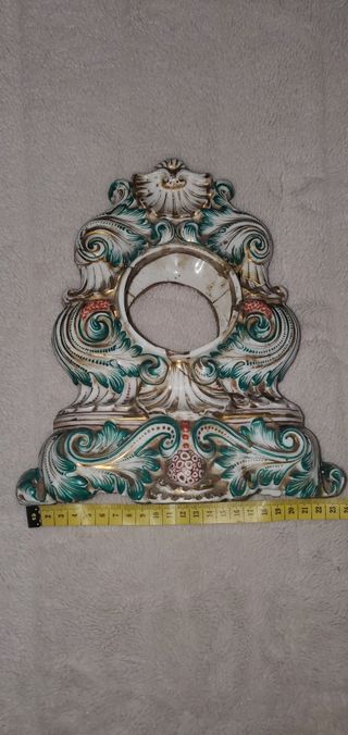 Scultura porta orologi antica