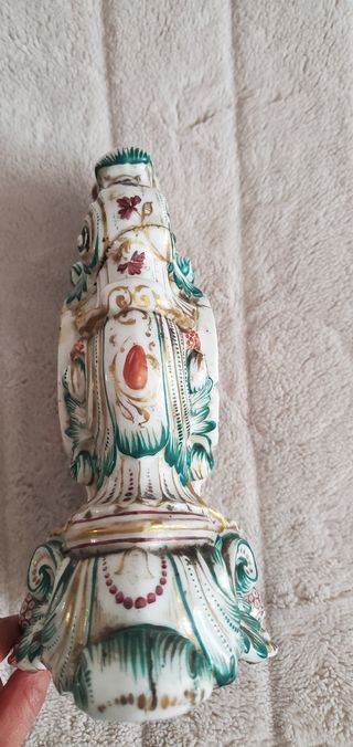 Scultura porta orologi antica